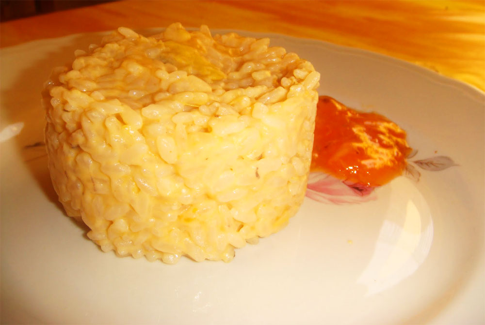 Risotto d'autunno con cachi, gorgonzola e speck
