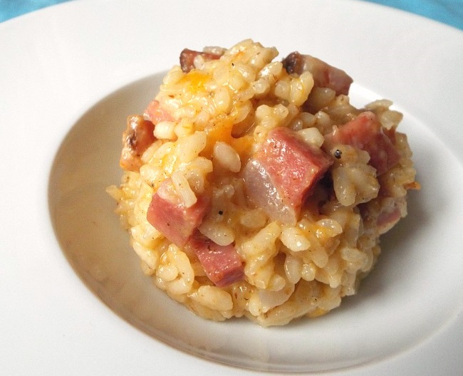 Risotto d'autunno con cachi, gorgonzola e speck